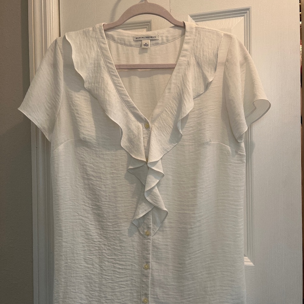 Flowing off white  colored short sleeve beautiful blouse